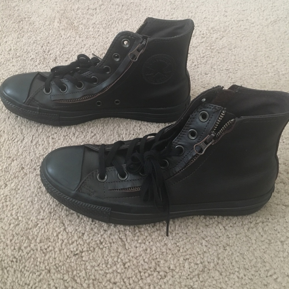 Brown leather converse
